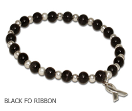 Melanoma awareness bracelet with black cat’s eye beads and sterling silver awareness ribbon